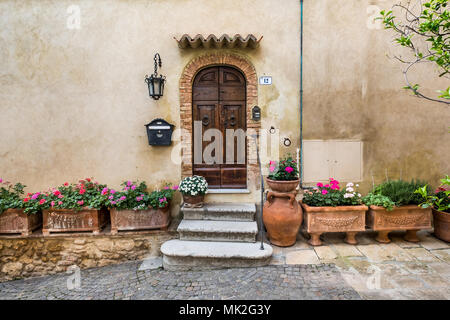 Bibbona, Leghorn, Italy - April 2018 the medieval village of Bibbona in Tuscany, traditional houses in the ancient historical village Stock Photo
