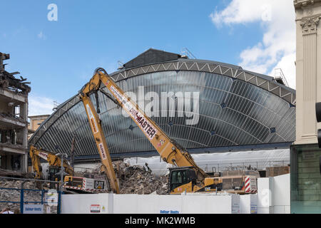 The previously hidden glass front of Glasgow Queen Street Station is visible again as the building in front is demolished Stock Photo