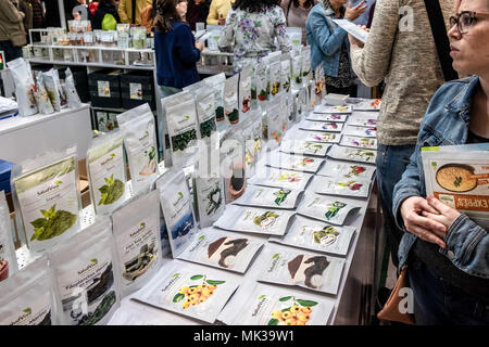 Barcelona, Catalonia, Spain. 6th May, 2018. A woman visitor of BioCultura is seen looking at new packed preparations of superfood. BioCultura, the Organic Products Fair and Responsible Consumption celebrates its 25th anniversary. It will bring together over 700 exhibitors dedicated to the sectors of food bio, organic cosmetics, sustainable fashion, home safe, responsible tourism, crafts and NGOs. Parallel to the exhibition more than 400 activities will be held and is expected to exceed 72,000 visitors. It will be held from 3 to 6 May at the Palau Sant Jordi in Barcelona. (Credit Image: © Paco Stock Photo