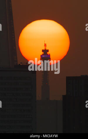 London, UK. 6th May 2018. The sunset behind the London shard and BT Tower on the evening before the hottest May bank holiday Monday is forecast. Credit: London pix/Alamy Live News Stock Photo