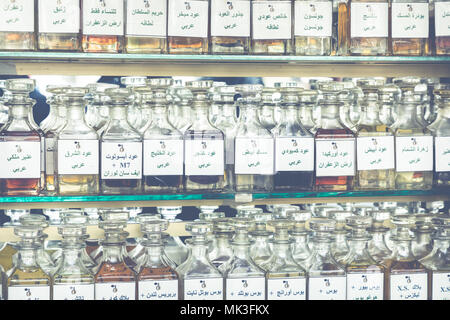 many different perfums in a store on the market Stock Photo