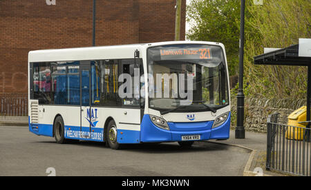 A public service bus operated by NAT Group parked in Talbot Green bus station Stock Photo