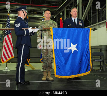 Brig. Gen. Darwin Craig, the Director of the Joint Staff for the Utah Air National Guard, is presented with a flag during his promotion ceremony to the rank of brigadier general at Roland R. Wright Air National Guard Base on Nov. 4, 2017. (U.S. Air National Guard photo by Staff Sgt. Danny Whitlock/Released) Stock Photo
