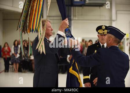 The Idaho National Guard held a change of command ceremony Sunday, Nov. 5, 2017 at Gowen Field to signify the transfer of authority between outgoing Commanding General Maj. Gen. Gary Sayler and the incoming Adjutant General Brig. Gen. Michael Garshak. The commander in chief, Governor C.L. 'Butch' Otter presided over the ceremony, which included a large troop formation, the passing of the colors, and custom military traditions. (Air National Guard photo by Master Sgt. Becky Vanshur/Released) Stock Photo