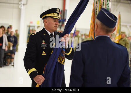 The Idaho National Guard held a change of command ceremony Sunday, Nov. 5, 2017 at Gowen Field to signify the transfer of authority between outgoing Commanding General Maj. Gen. Gary Sayler and the incoming Commander Brig. Gen. Michael Garshak. The commander in chief, Governor C.L. 'Butch' Otter presided over the ceremony, which included a large troop formation, the passing of the colors, and custom military traditions. (Air National Guard photo by Master Sgt. Becky Vanshur/Released) Stock Photo