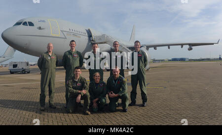 U.S. Air Force KC-135 Stratotanker aircrew, assigned to RAF Mildenhall, England, and Royal Air Force A330 Voyager aircrew stand in front of an RAF Voyager Nov. 1, 2017, on the flight line at RAF Brize Norton, England. The NATO allies executed the first KC-135 and RAF Voyager cell aerial refueling when two RAF Tornado GR4s received fuel off the east coast of Scotland. (U.S Air Force photo by Senior Airman Justine Rho) Stock Photo