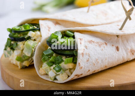 Egg salad and avocado wraps, Mexican style breakfast or tasty lunch Stock Photo