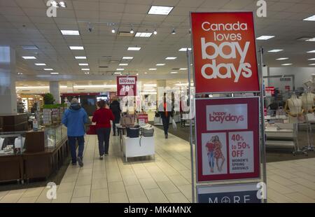 People walking in Hudson’s Bay Retail Store Interior during Bay Days Sale in Calgary, Alberta Market Mall shopping centre Stock Photo