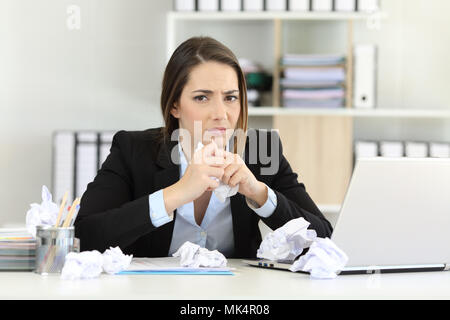 Front view portrait of a frustrated executive without ideas looking at you at office Stock Photo