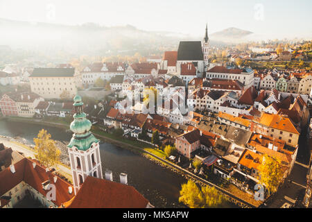 Panoramic view of the historic city of Cesky Krumlov with famous Cesky Krumlov Castle, a UNESCO World Heritage Site since 1992, in beautiful golden mo Stock Photo