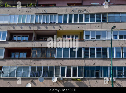 Sniper bullet holes in a facade of a building, Sarajevo, Bosnia Stock Photo