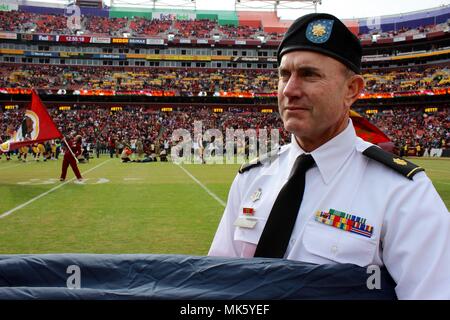 D.C.-area service members participate in the Washington Redskins Salute to  Service match-up against the Minnesota Vikings at FedEx Field on Nov. 12.  The event required 107 service members alone to unveil a