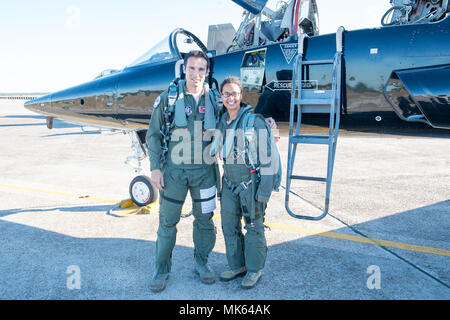 Major Trevor 'Gonkey' Hartsock of the 301st Fighter Squadron and Tech. Sgt. Angelica Mendoza from the 104th Fighter Wing prior to flying in a T-38 aircraft during exercise Checkered Flag at Tyndall Air Force Base, Panama City, Florida. Stock Photo