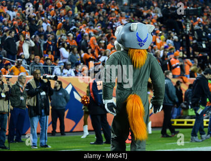 Miles, the Denver Broncos' mascot, pumps up the crowd in his Air Force  flight suit during the a Salute to Service game Nov. 12, 2017, at Sports  Authority Stadium at Mile High in Denver. Miles wore a 120th Fighter  Squadron patch on his left shoulder in