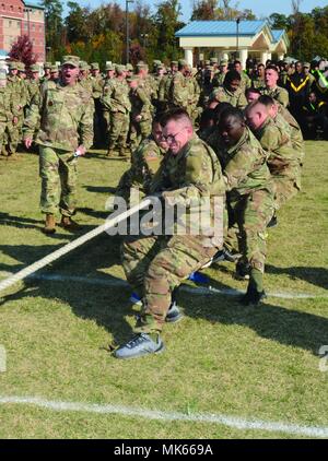Soldiers of the 16th Ordnance Battalion team stand at the position of ...
