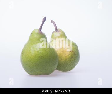 pears or two green pears on a background Stock Photo
