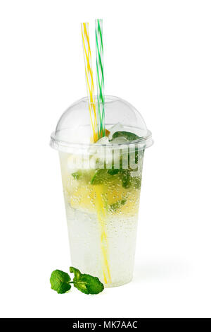 Cooling lemonade drink in plastic glass with lemon slices, mint and sparkling water isolated on white background Stock Photo
