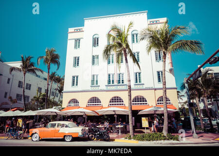 MIAMI BEACH, FLORIDA, USA - FEBRUARY 18, 2018: Vintage Car Parked along Ocean Drive in the Famous Art Deco District in South Beach. South Beach, FL Stock Photo