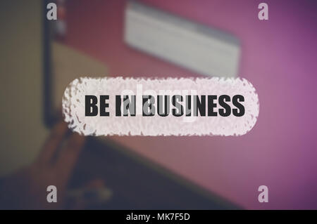 Be in business word with blurring business background Stock Photo