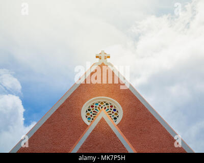 Top of Roof Church with Cross of Ancient French architecture, Domaine de Maria Church  and Blue Sky with Space at Dalat, Vietnam Stock Photo
