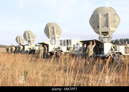 FORT GORDON, GA – The training area where Soldiers assigned to A Company, 50th Expeditionary Signal Battalion, 35th Theater Tactical Signal Brigade learn how to set up the Satellite Transportable Terminal (STT) and learn the different intricacies of the system. In an exercise the unit is calling the “Road to War”, leaders of A Company are training Soldiers on a multitude of different combat and equipment related training objectives. (U.S. Army photo by Sgt. Victor Everhart Jr.) Stock Photo