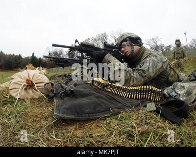 Soldiers with Alpha Company, 287th Infantry, 2nd Brigade Combat Team of Fort Drum, N.Y., conduct live-fire training at a range on North Post during operations for the Vigilant Shield exercise Nov. 3, 2017, at Fort McCoy, Wis. More than 100 Soldiers with 10th Mountain Division units of Fort Drum, N.Y., deployed to Fort McCoy in late October to participate in the emergency deployment readiness exercise. (U.S. Army Photo by Greg Mason, Fort McCoy Multimedia/Visual Information Office, Fort McCoy, Wis.) Stock Photo