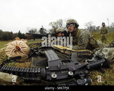 Soldiers with Alpha Company, 287th Infantry, 2nd Brigade Combat Team of Fort Drum, N.Y., conduct live-fire training at a range on North Post during operations for the Vigilant Shield exercise Nov. 3, 2017, at Fort McCoy, Wis. More than 100 Soldiers with 10th Mountain Division units of Fort Drum, N.Y., deployed to Fort McCoy in late October to participate in the emergency deployment readiness exercise. (U.S. Army Photo by Greg Mason, Fort McCoy Multimedia/Visual Information Office, Fort McCoy, Wis.) Stock Photo