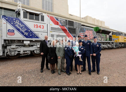 Members of Team Offutt pose for a group photo with other veterans and Union Pacific employees prior to attending a Veterans Day ceremony held at the Durham Western Heritage Museum in downtown Omaha, Nebraska November 10, 2017. The ceremony honored past and present veterans and included a newly unveiled “Spirit” U.P. No. 1943 locomotive with a custom military services paint scheme that traveled to the museum for the ceremony. (U.S. Air Force photo by Delanie Stafford) Stock Photo