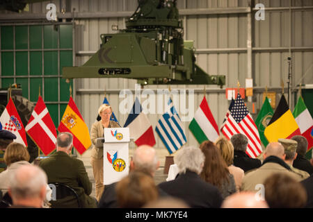 Ann Schrijvers, mayor of Zutendaal, speaks to the audience, during the ribbon cutting ceremony of U.S. Army's pre-positioned stock (APS) 2 site, in Zutendaal, Belgium, Nov. 21, 2017. APS sites are vital components of total Army readiness as they provide space for the U.S. military to store equipment and prepare to fight within days instead of months. (U.S. Army photo by Visual Information Specialist Pierre-Etienne Courtejoie) Stock Photo