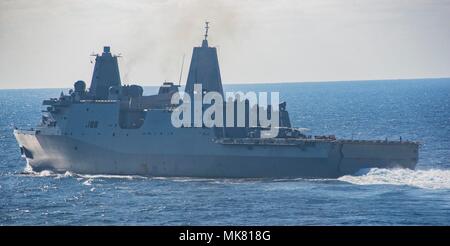 ATLANTIC OCEAN (Nov. 26, 2017) The amphibious transport dock ship USS New York (LPD 21) transits the Atlantic Ocean. The amphibious assault ship USS Iwo Jima (LHD 7), components of the Iwo Jima Amphibious Ready Group and the 26th Marine Expeditionary Unit are conducting a Combined Composite Training Unit Exercise that is the culmination of training for the Navy-Marine Corps team and will certify them for deployment. (U.S. Navy photo by Mass Communication Specialist 3rd Class Kevin Leitner/Released) Stock Photo