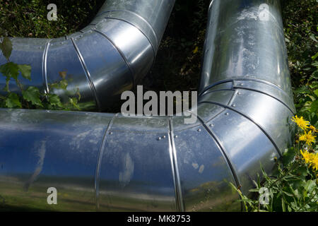 galvanized sheet metal pipe for drainage Zinc drain pipe Stock Photo