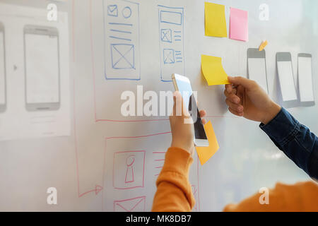 Designer drawing Web template layout development responsive branding Concept Stock Photo
