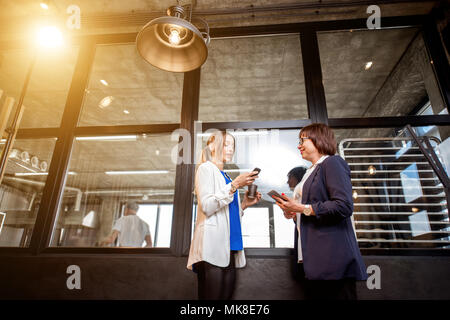 Bakery office with business women talking together Stock Photo