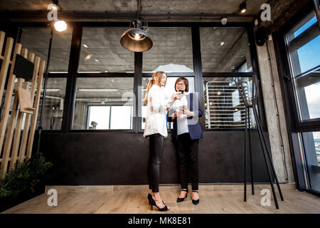 Bakery office with business women talking together Stock Photo
