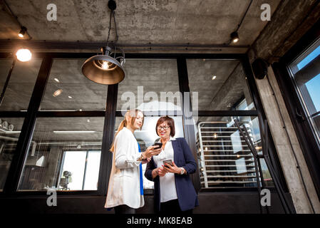 Bakery office with business women talking together Stock Photo