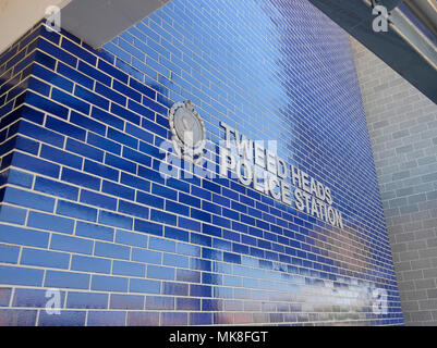 front of new Tweed Heads Police Station including sign on tiled wall Stock Photo