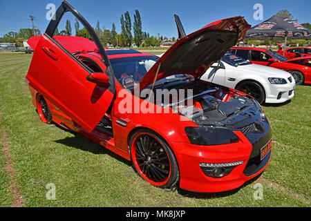 holden ss ute wth gullwing doors, in red, heavily customized at 'glen on wheels' car festival in glen innes in new south wales, australia, 2016 Stock Photo