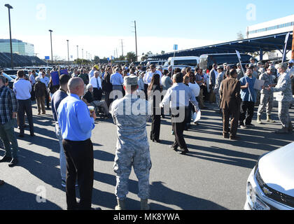 Space and Missile Systems Center is a United States Air Force organization based at Los Angeles Air Force Base, California, overseeing space and missile acquisition programs. On November 8, 2017, Operational Readiness Exercise 18-1 required fire alarm evacuation, accountability checks, and communication through the Unit Control Center. The archival image documents staff participation in the emergency drill. Stock Photo