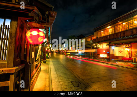 Kyoto, Japan - April 24, 2017: light trail by night at Gion Kobu district with typical Kaiseki restaurant. Gion is Kyoto's most famous geisha district, Hanamachi, located in Kyoto, Japan. Stock Photo