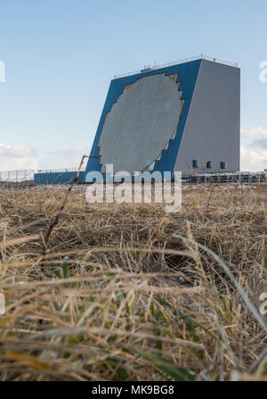 The COBRA DANE radar is a single faced ground-based, L-band phased-array radar  located at Eareckson Air Station, Shemya, Alaska. The primary mission of COBRA DANE is to collect radar metric and signature data on foreign ballistic missile events. Additional missions include collecting space surveillance data on new foreign launches and satellites in low-earth orbit. The radar has a 95-foot diameter phased array and the capability to track and record data on as many as 120 objects simultaneously. Stock Photo