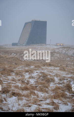 The COBRA DANE radar is a single faced ground-based, L-band phased-array radar  located at Eareckson Air Station, Shemya, Alaska. The primary mission of COBRA DANE is to collect radar metric and signature data on foreign ballistic missile events. Additional missions include collecting space surveillance data on new foreign launches and satellites in low-earth orbit. The radar has a 95-foot diameter phased array and the capability to track and record data on as many as 120 objects simultaneously. Stock Photo