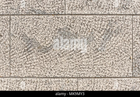 Dirty Outside old granite terrace tiles. Image of exterior flooring with old grey medieval pavement slabs in old European Mediterranean city centre. Stock Photo