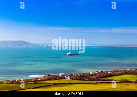 Looking west over Ringstead village towards Chesil Beach and Isle of Portland from White Nothe Point on the Jurassic Coast Path, Dorset, England, UK Stock Photo