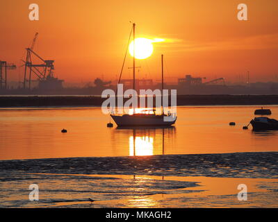 Queenborough, Kent, UK. 7th May, 2018. UK Weather: a golden sunset in Queenborough, Kent as the early May bank holiday weather breaks temperature record. Credit: James Bell/Alamy Live News Stock Photo