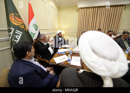 May 7, 2018 - A political meeting takes place to establish the Shia Fatah Alliance, which is political coalition participating in the 2018 Iraqi elections. It is led by the former senior commander of the Hashd al-Shaabi (Popular Mobilisation Forces) and Secretary General of the Badr Organization, Hadi Al- Amiri. The Shia Fatah Alliance is very popular among Iraqi people; it is one the prominent coalition in the elections, and the closest to Iran. The Popular Mobilisation Forces had joined the Iraqi army and played a fundamental role in the fight against the Islamic State. Parliamentary and loc Stock Photo