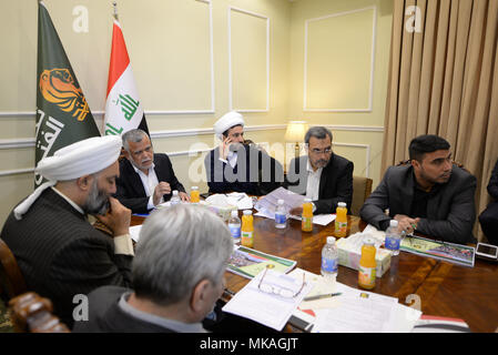 May 6, 2018 - A political meeting takes place to establish the Shia Fatah Alliance, which is political coalition participating in the 2018 Iraqi elections. It is led by the former senior commander of the Hashd al-Shaabi (Popular Mobilisation Forces) and Secretary General of the Badr Organization, Hadi Al- Amiri. The Shia Fatah Alliance is very popular among Iraqi people; it is one the prominent coalition in the elections, and the closest to Iran. The Popular Mobilisation Forces had joined the Iraqi army and played a fundamental role in the fight against the Islamic State. Parliamentary and loc Stock Photo