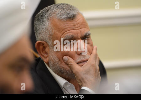 May 6, 2018 - A political meeting takes place to establish the Shia Fatah Alliance, which is political coalition participating in the 2018 Iraqi elections. It is led by the former senior commander of the Hashd al-Shaabi (Popular Mobilisation Forces) and Secretary General of the Badr Organization, Hadi Al- Amiri. The Shia Fatah Alliance is very popular among Iraqi people; it is one the prominent coalition in the elections, and the closest to Iran. The Popular Mobilisation Forces had joined the Iraqi army and played a fundamental role in the fight against the Islamic State. Parliamentary and loc Stock Photo