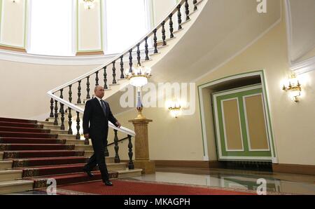 Moscow, Russia. 07th May, 2018. Russian President Vladimir Putin walks through the halls of the Kremlin on his way to be sworn-in for the forth time as the President of the Russian Federation May 7, 2018 in Moscow, Russia. (Kremlin Pool via Credit: Planetpix/Alamy Live News Stock Photo