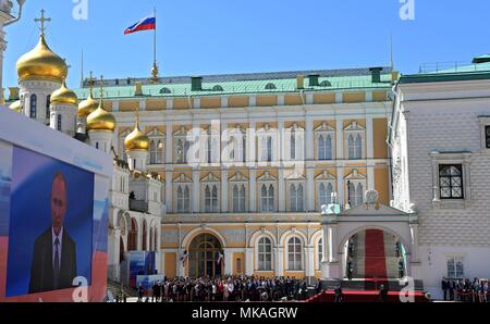 Moscow, Russia. 07th May, 2018. Russian President Vladimir Putin watches a review of the Presidential Regiment to mark his fourth inauguration on Cathedral Square in the Kremlin Grand Palace May 7, 2018 in Moscow, Russia. Putin was sworn-in for the forth time as the President of the Russian Federation. (Kremlin Pool via Credit: Planetpix/Alamy Live News Stock Photo