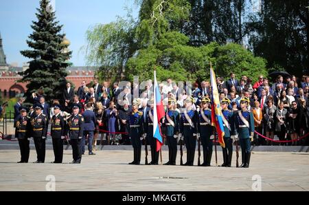 Moscow, Russia. 07th May, 2018. Russian President Vladimir Putin watches a review of the Presidential Regiment to mark his fourth inauguration on Cathedral Square in the Kremlin Grand Palace May 7, 2018 in Moscow, Russia. Putin was sworn-in for the forth time as the President of the Russian Federation. (Kremlin Pool via Credit: Planetpix/Alamy Live News Stock Photo